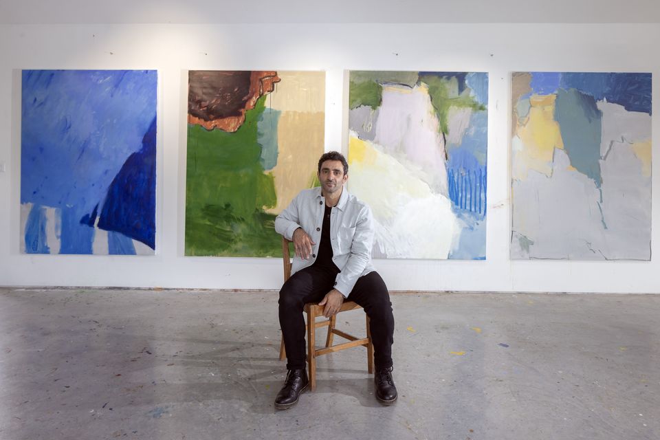Artist Richard Hearns in the studio next to his home in The Burren. Behind him are paintings he is currently working on for his forthcoming exhibition in the Cadogan Gallery in London in September. Photo: Tony Gavin